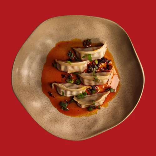 A plate of dumplings, shot from above